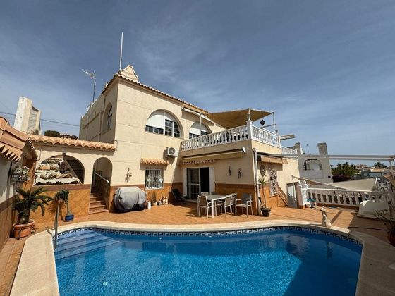 Foto 1 de Venta de casa en Villamartín de 5 habitaciones con terraza y piscina
