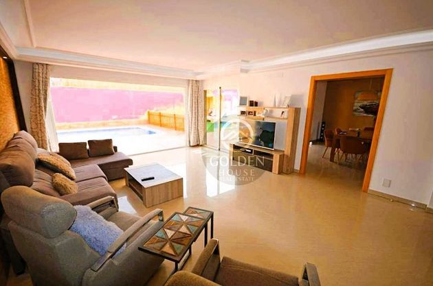 Foto 1 de Chalet en venta en urbanización Puerto Azul de 5 habitaciones con terraza y piscina