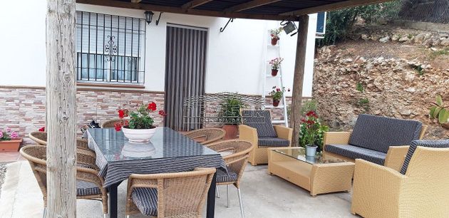 Foto 1 de Casa adossada en venda a Almodóvar del Río de 2 habitacions amb piscina i aire acondicionat