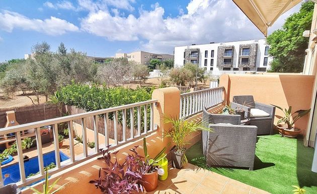 Foto 1 de Casa adossada en venda a S'Eixample - Can Misses de 4 habitacions amb terrassa i piscina