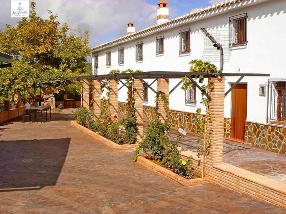 Foto 2 de Casa rural en venta en Villanueva del Trabuco de 8 habitaciones con jardín y calefacción