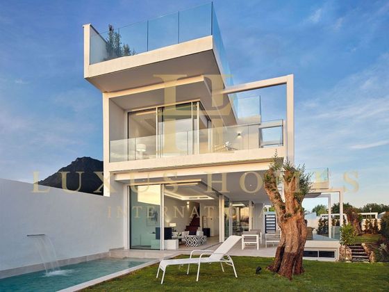 Foto 2 de Chalet en venta en Playa Bajadilla - Puertos de 3 habitaciones con terraza y piscina