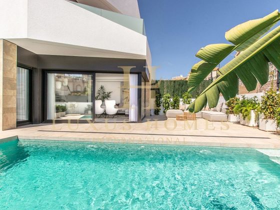Foto 1 de Xalet en venda a Playa Flamenca - Punta Prima de 3 habitacions amb terrassa i piscina