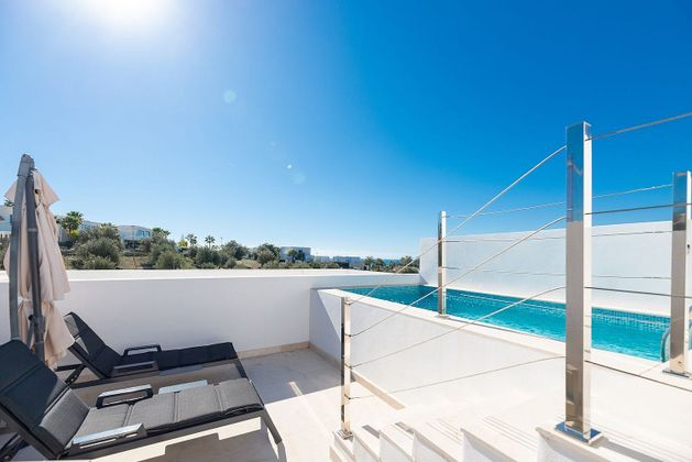 Foto 1 de Casa adossada en venda a Río Real de 4 habitacions amb terrassa i piscina