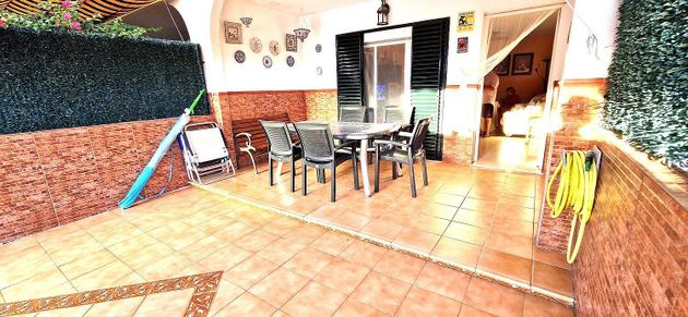 Foto 1 de Venta de casa en Cartaya de 3 habitaciones con piscina y balcón