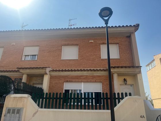 Foto 1 de Casa en venta en calle Castellon Calig de 4 habitaciones con terraza y garaje