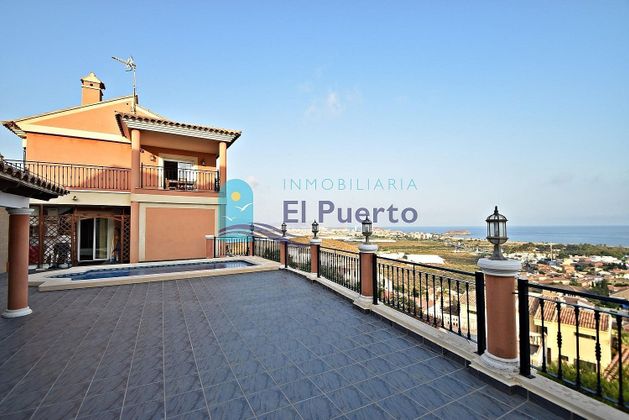 Foto 1 de Chalet en venta en Bolnuevo de 6 habitaciones con terraza y piscina