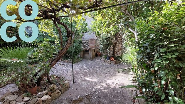 Foto 1 de Casa en venda a Puigpunyent de 4 habitacions amb terrassa i jardí