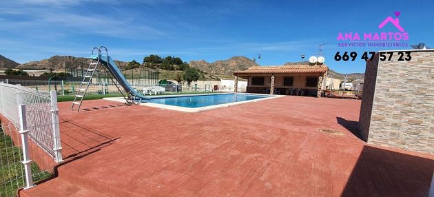Foto 2 de Chalet en venta en Águilas ciudad de 4 habitaciones con terraza y piscina