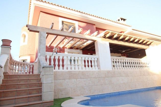 Foto 1 de Casa adosada en venta en Badia Blava-Badia Gran-Tolleric de 4 habitaciones con terraza y piscina