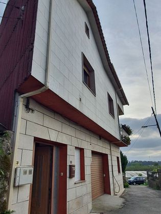 Foto 2 de Casa adosada en venta en calle Caleiro de 4 habitaciones con garaje y balcón