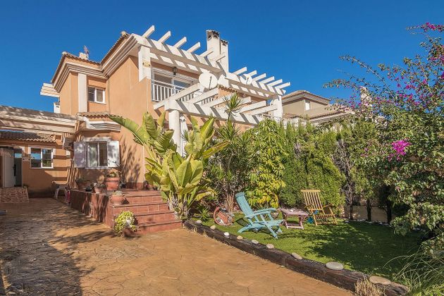 Foto 1 de Casa adosada en venta en calle Monte de Santa Pola de 4 habitaciones con terraza y piscina