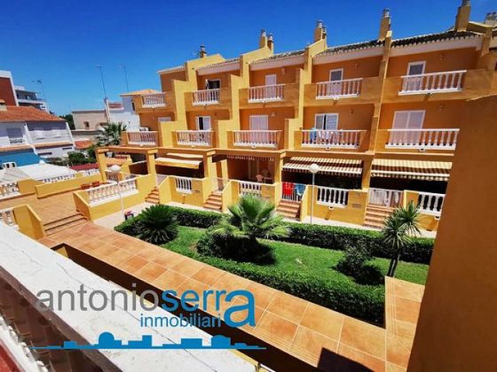 Foto 1 de Alquiler de casa en El Perelló - Les Palmeres - Mareny de Barraquetes de 6 habitaciones con terraza y piscina