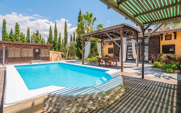 Foto 1 de Venta de casa adosada en Algaida de 8 habitaciones con piscina y aire acondicionado