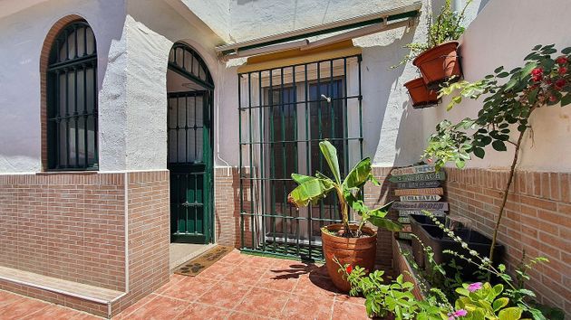 Foto 2 de Venta de casa adosada en Playamar de 3 habitaciones con terraza y garaje
