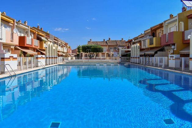 Foto 2 de Casa adossada en venda a Santiago de la Ribera de 3 habitacions amb terrassa i piscina