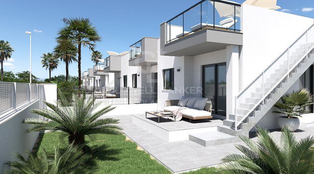 Foto 1 de Casa adossada en venda a calle Partida Platja Almadrava de 2 habitacions amb terrassa i piscina