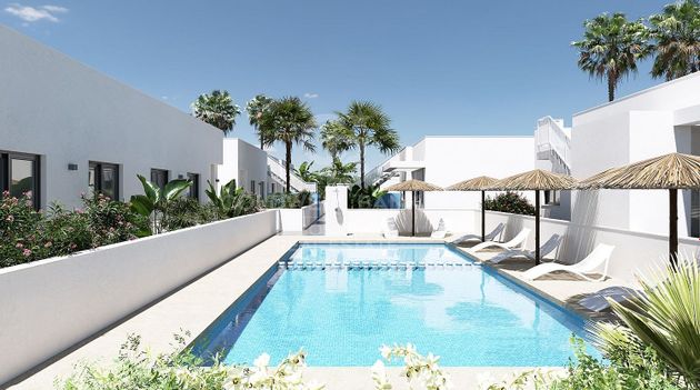 Foto 2 de Casa adossada en venda a calle Partida Platja Almadrava de 2 habitacions amb terrassa i piscina