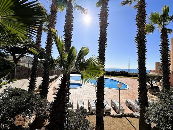 Foto 1 de Venta de casa adosada en Premià de Dalt de 5 habitaciones con terraza y piscina