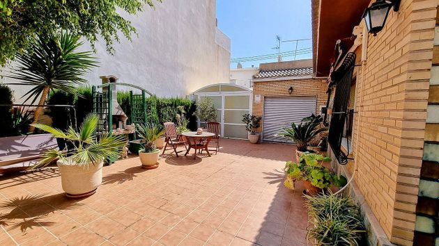Foto 1 de Venta de casa adosada en calle De Meseguer de 5 habitaciones con terraza y garaje