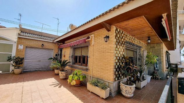 Foto 2 de Venta de casa adosada en calle De Meseguer de 5 habitaciones con terraza y garaje
