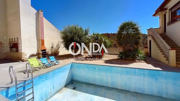 Foto 2 de Casa adossada en venda a Camarasa de 6 habitacions amb terrassa i piscina