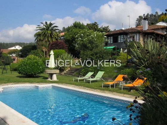 Foto 1 de Xalet en venda a calle Lugar de Santianes de 5 habitacions amb piscina i jardí