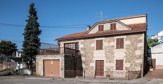 Foto 1 de Casa en venda a Pobra do Caramiñal (A) de 4 habitacions amb terrassa i garatge