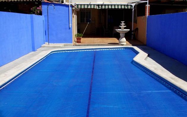 Foto 1 de Casa adossada en venda a Magán de 3 habitacions amb terrassa i piscina