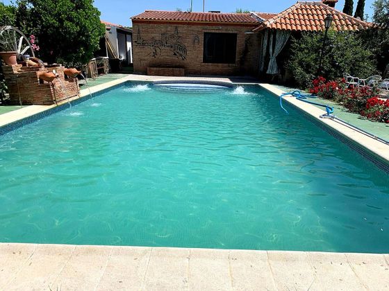 Foto 1 de Venta de casa en Villaverde del Río de 1 habitación con piscina y jardín