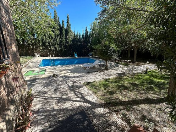 Foto 2 de Venta de chalet en Nuez de Ebro de 4 habitaciones con terraza y piscina