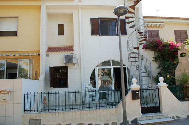 Foto 2 de Casa adosada en venta en El Mojón de 3 habitaciones con terraza y balcón