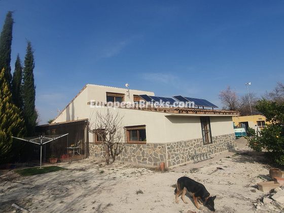 Foto 2 de Chalet en venta en Benigánim de 4 habitaciones con terraza y jardín