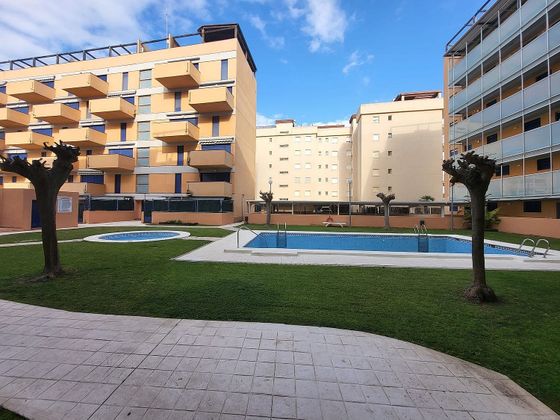 Foto 1 de Piso en venta en Daimús de 2 habitaciones con piscina y balcón