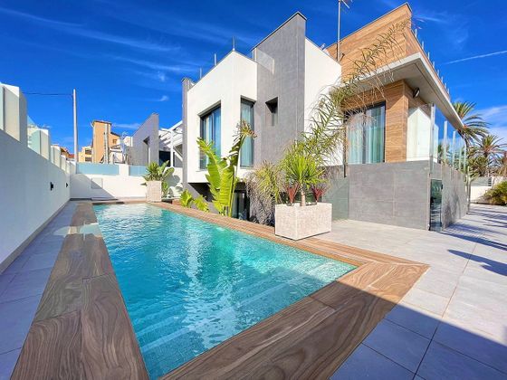 Foto 1 de Casa en venda a Torrelamata - La Mata de 4 habitacions amb terrassa i piscina