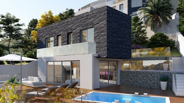 Foto 2 de Venta de chalet en calle Sierra del Endrinal de 3 habitaciones con terraza y piscina