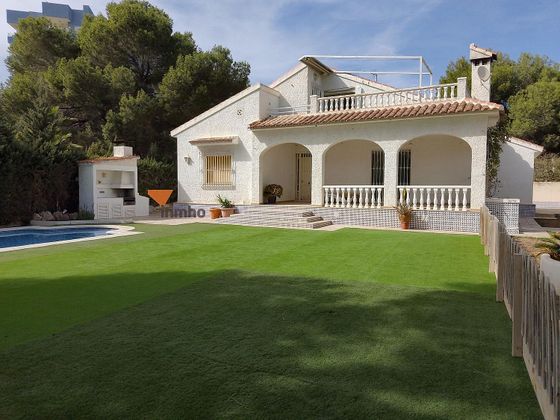 Foto 1 de Xalet en venda a Dehesa de Campoamor - La Regia - Aguamarina de 5 habitacions amb terrassa i piscina