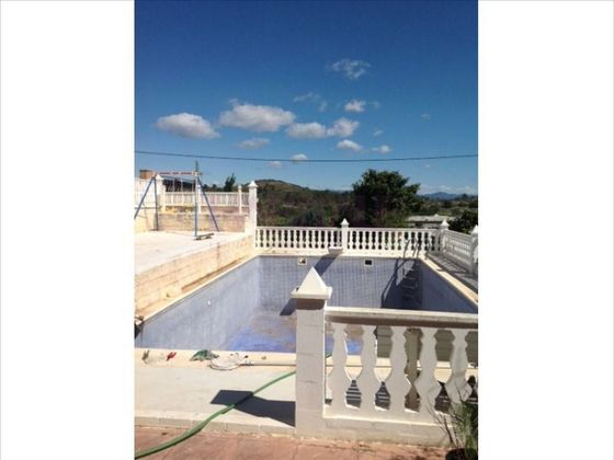Foto 1 de Chalet en venta en Riba-roja de Túria de 6 habitaciones con piscina y aire acondicionado