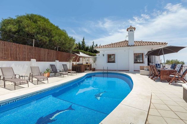Foto 1 de Chalet en venta en calle Mijas del Faro de 5 habitaciones con terraza y piscina