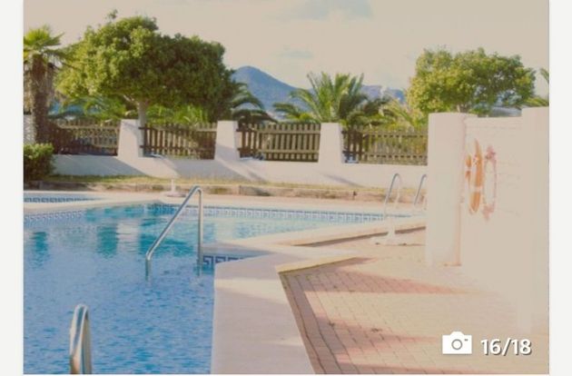 Foto 1 de Casa adosada en alquiler en calle Tortola de 2 habitaciones con terraza y piscina