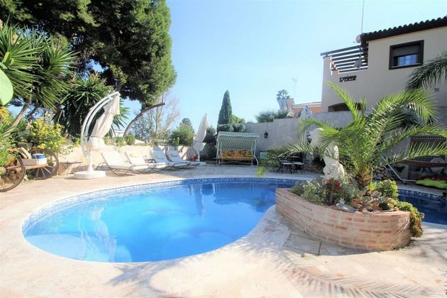 Foto 1 de Casa en venda a El Pinar - Palacio de Congresos de 5 habitacions amb terrassa i piscina