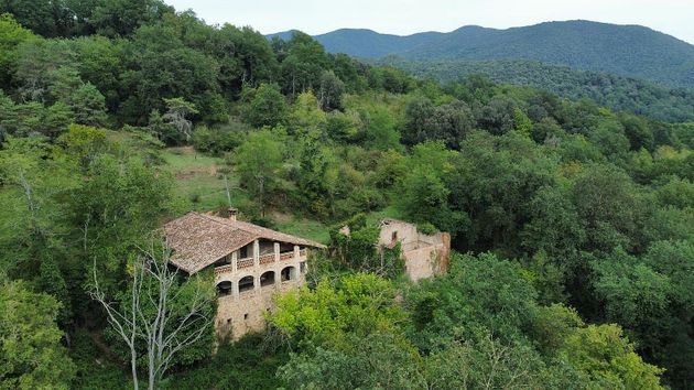 Foto 1 de Casa rural en venta en Sant Joan les Fonts de 7 habitaciones con jardín