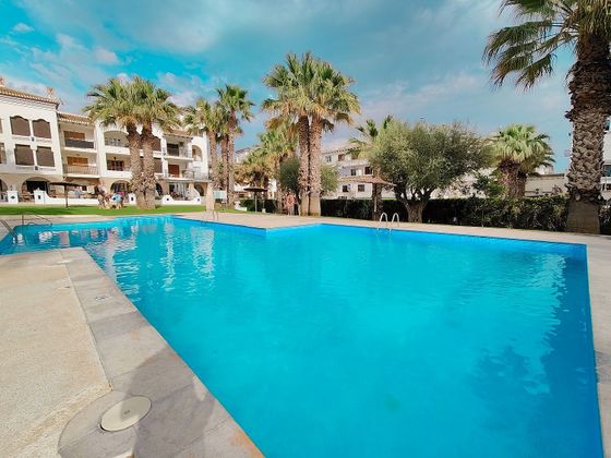 Foto 1 de Pis en lloguer a plaza Villamartin de 2 habitacions amb terrassa i piscina
