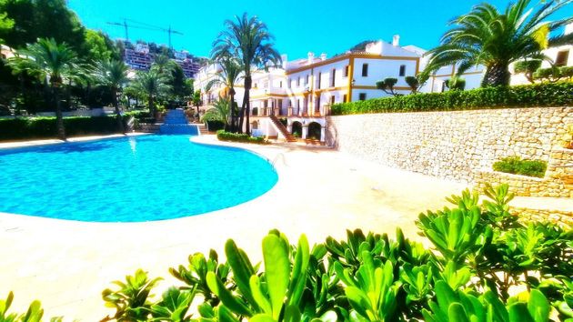 Foto 1 de Casa adossada en venda a urbanización La Sella de 2 habitacions amb terrassa i piscina