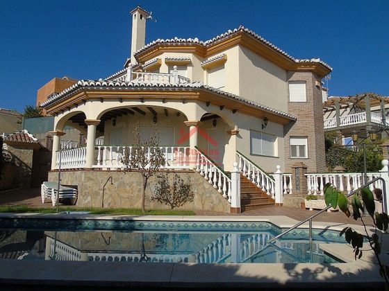 Foto 1 de Piso en venta en Viña Málaga de 5 habitaciones con terraza y piscina