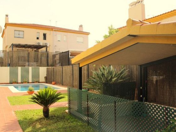 Foto 1 de Casa en venta en Gines de 5 habitaciones con terraza y piscina