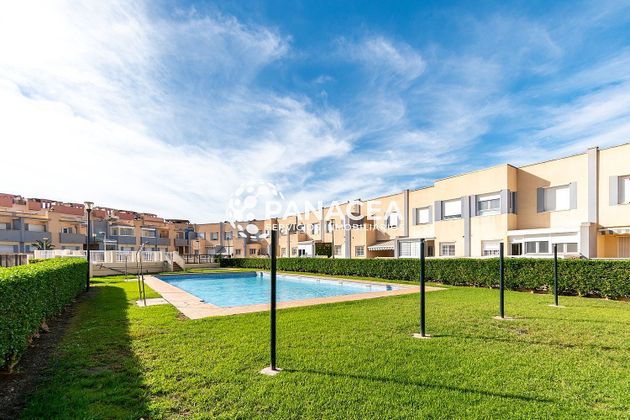 Foto 1 de Casa en venta en Almerimar - Balerma - San Agustín - Costa de Ejido de 4 habitaciones con piscina y garaje