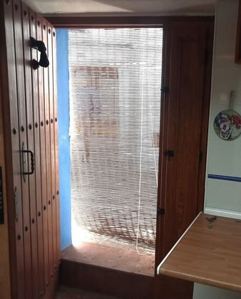 Foto 1 de Venta de casa en Chelva de 3 habitaciones con aire acondicionado