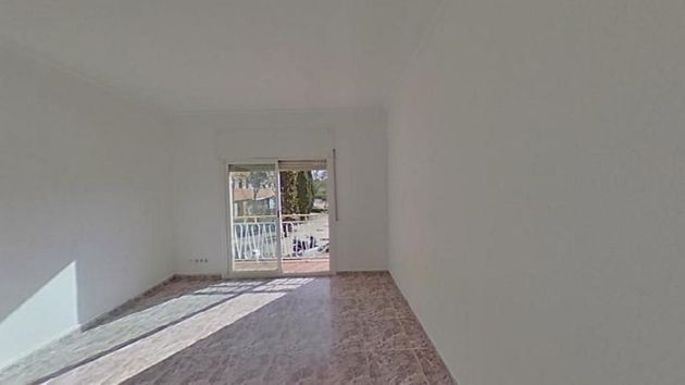 Foto 1 de Venta de piso en El Castell-Poble Vell de 3 habitaciones y 73 m²