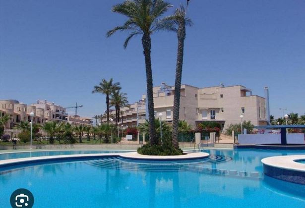 Foto 1 de Pis en lloguer a Dehesa de Campoamor - La Regia - Aguamarina de 2 habitacions amb terrassa i piscina
